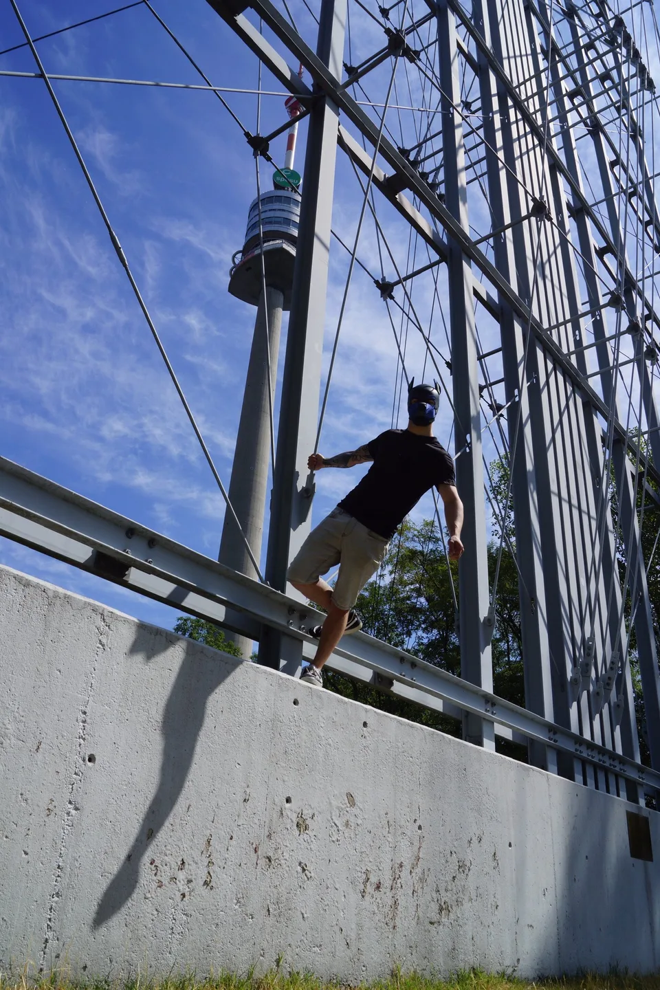 On a steel tower, Donauturm behind
